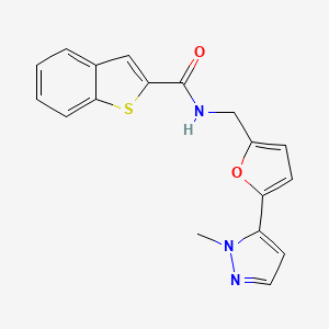 molecular formula C18H15N3O2S B2878463 N-{[5-(1-methyl-1H-pyrazol-5-yl)furan-2-yl]methyl}-1-benzothiophene-2-carboxamide CAS No. 2415563-75-4