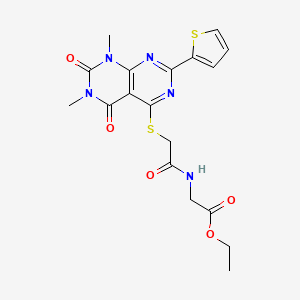 molecular formula C18H19N5O5S2 B2878904 Ethyl 2-(2-((6,8-dimethyl-5,7-dioxo-2-(thiophen-2-yl)-5,6,7,8-tetrahydropyrimido[4,5-d]pyrimidin-4-yl)thio)acetamido)acetate CAS No. 847191-94-0