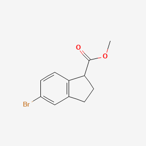 molecular formula C11H11BrO2 B2878975 Methyl 5-bromo-2,3-dihydro-1H-indene-1-carboxylate CAS No. 112933-48-9