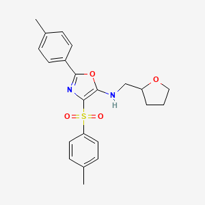 molecular formula C22H24N2O4S B2879716 N-((tetrahydrofuran-2-yl)methyl)-2-(p-tolyl)-4-tosyloxazol-5-amine CAS No. 862738-69-0