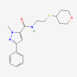 molecular formula C18H23N3O2S B2882903 1-methyl-N-[2-(oxan-4-ylsulfanyl)ethyl]-3-phenyl-1H-pyrazole-5-carboxamide CAS No. 2034484-83-6