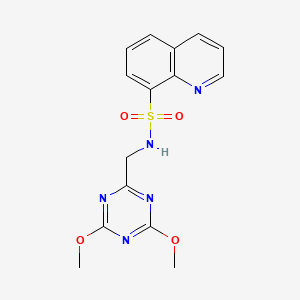 molecular formula C15H15N5O4S B2884108 N-[(4,6-dimethoxy-1,3,5-triazin-2-yl)methyl]quinoline-8-sulfonamide CAS No. 2034574-71-3