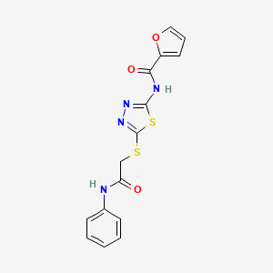 molecular formula C15H12N4O3S2 B2884225 N-[5-(2-anilino-2-oxoethyl)sulfanyl-1,3,4-thiadiazol-2-yl]furan-2-carboxamide CAS No. 392290-76-5