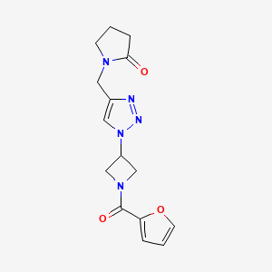 molecular formula C15H17N5O3 B2884762 1-((1-(1-(furan-2-carbonyl)azetidin-3-yl)-1H-1,2,3-triazol-4-yl)methyl)pyrrolidin-2-one CAS No. 2034341-68-7