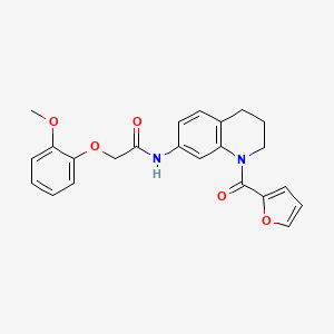 molecular formula C23H22N2O5 B2884770 N-[1-(furan-2-carbonyl)-1,2,3,4-tetrahydroquinolin-7-yl]-2-(2-methoxyphenoxy)acetamide CAS No. 1005294-17-6