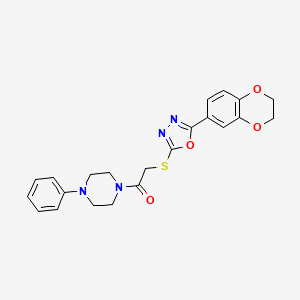 molecular formula C22H22N4O4S B2887682 1-({[5-(2,3-Dihydro-1,4-benzodioxin-6-yl)-1,3,4-oxadiazol-2-yl]thio}acetyl)-4-phenylpiperazine CAS No. 851129-81-2