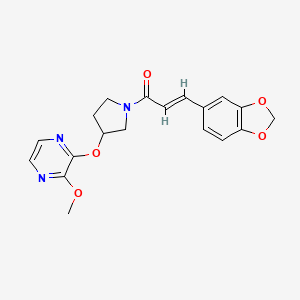 (E)-3-(benzo[d][1,3]dioxol-5-yl)-1-(3-((3-methoxypyrazin-2-yl)oxy)pyrrolidin-1-yl)prop-2-en-1-one