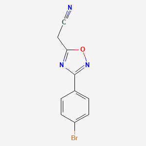 molecular formula C10H6BrN3O B2888950 2-[3-(4-Bromophenyl)-1,2,4-oxadiazol-5-yl]acetonitrile CAS No. 937629-16-8