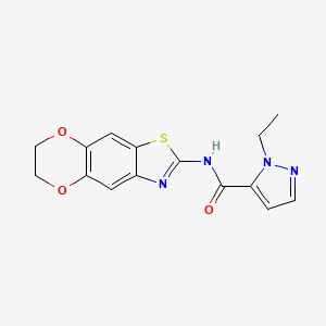 molecular formula C15H14N4O3S B2889396 N-(6,7-dihydro-[1,4]dioxino[2,3-f][1,3]benzothiazol-2-yl)-2-ethylpyrazole-3-carboxamide CAS No. 1170792-28-5