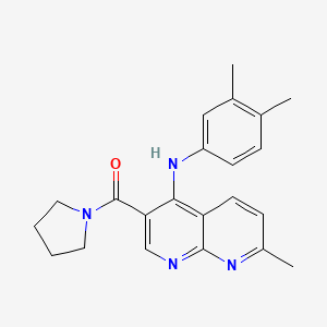 molecular formula C22H24N4O B2890395 N-(3,4-dimethylphenyl)-7-methyl-3-(pyrrolidine-1-carbonyl)-1,8-naphthyridin-4-amine CAS No. 1251702-69-8