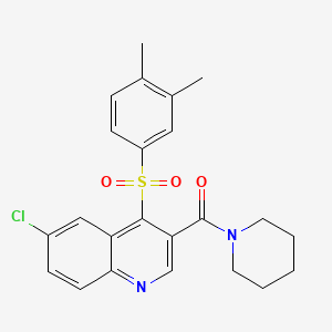 molecular formula C23H23ClN2O3S B2890690 6-CHLORO-4-(3,4-DIMETHYLBENZENESULFONYL)-3-(PIPERIDINE-1-CARBONYL)QUINOLINE CAS No. 1111164-78-3