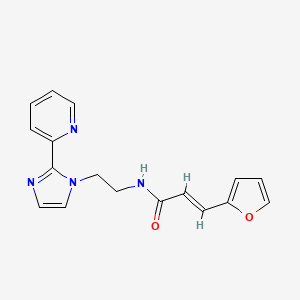 (E)-3-(furan-2-yl)-N-(2-(2-(pyridin-2-yl)-1H-imidazol-1-yl)ethyl)acrylamide
