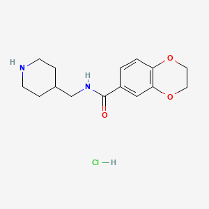 molecular formula C15H21ClN2O3 B2891684 N-(Piperidin-4-ylmethyl)-2,3-dihydrobenzo[b][1,4]dioxine-6-carboxamide hydrochloride CAS No. 1353947-91-7