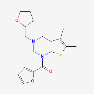 molecular formula C18H22N2O3S B2891933 (5,6-dimethyl-3-((tetrahydrofuran-2-yl)methyl)-3,4-dihydrothieno[2,3-d]pyrimidin-1(2H)-yl)(furan-2-yl)methanone CAS No. 618409-99-7