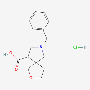 molecular formula C15H20ClNO3 B2893723 7-苄基-2-氧杂-7-氮杂螺[4.4]壬烷-9-羧酸盐酸盐 CAS No. 2044713-09-7