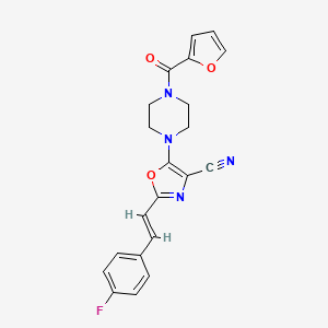 (E)-2-(4-fluorostyryl)-5-(4-(furan-2-carbonyl)piperazin-1-yl)oxazole-4-carbonitrile