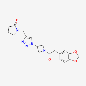 molecular formula C19H21N5O4 B2894517 1-((1-(1-(2-(benzo[d][1,3]dioxol-5-yl)acetyl)azetidin-3-yl)-1H-1,2,3-triazol-4-yl)methyl)pyrrolidin-2-one CAS No. 2034407-38-8