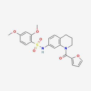 molecular formula C22H22N2O6S B2895413 N-[1-(furan-2-carbonyl)-1,2,3,4-tetrahydroquinolin-7-yl]-2,4-dimethoxybenzene-1-sulfonamide CAS No. 946369-71-7