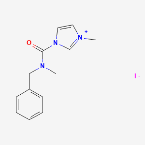 1-[benzyl(methyl)carbamoyl]-3-methyl-1H-imidazol-3-ium iodide