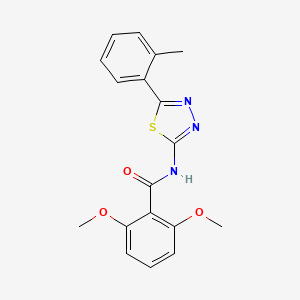 molecular formula C18H17N3O3S B2898549 2,6-dimethoxy-N-[5-(2-methylphenyl)-1,3,4-thiadiazol-2-yl]benzamide CAS No. 391863-39-1