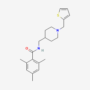 2,4,6-trimethyl-N-((1-(thiophen-2-ylmethyl)piperidin-4-yl)methyl)benzamide