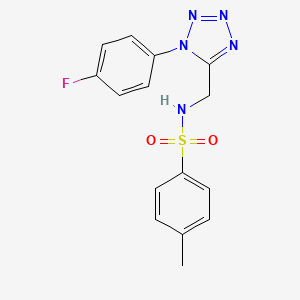 molecular formula C15H14FN5O2S B2899566 N-((1-(4-fluorophenyl)-1H-tetrazol-5-yl)methyl)-4-methylbenzenesulfonamide CAS No. 942000-29-5