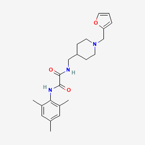 B2905663 N1-((1-(furan-2-ylmethyl)piperidin-4-yl)methyl)-N2-mesityloxalamide CAS No. 953181-23-2