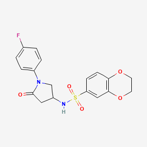 molecular formula C18H17FN2O5S B2909100 N-[1-(4-fluorophenyl)-5-oxopyrrolidin-3-yl]-2,3-dihydro-1,4-benzodioxine-6-sulfonamide CAS No. 896315-03-0
