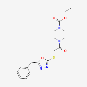 molecular formula C18H22N4O4S B2909434 ETHYL 4-{2-[(5-BENZYL-1,3,4-OXADIAZOL-2-YL)SULFANYL]ACETYL}PIPERAZINE-1-CARBOXYLATE CAS No. 851129-47-0