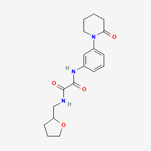molecular formula C18H23N3O4 B2909598 N-[(oxolan-2-yl)methyl]-N'-[3-(2-oxopiperidin-1-yl)phenyl]ethanediamide CAS No. 941920-02-1