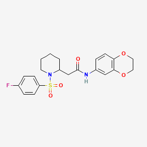 molecular formula C21H23FN2O5S B2909629 N-(2,3-dihydro-1,4-benzodioxin-6-yl)-2-[1-(4-fluorobenzenesulfonyl)piperidin-2-yl]acetamide CAS No. 1021041-34-8