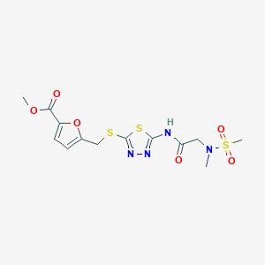 molecular formula C13H16N4O6S3 B2909639 methyl 5-(((5-(2-(N-methylmethylsulfonamido)acetamido)-1,3,4-thiadiazol-2-yl)thio)methyl)furan-2-carboxylate CAS No. 1251627-53-8