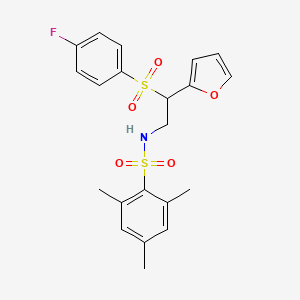 N-(2-((4-fluorophenyl)sulfonyl)-2-(furan-2-yl)ethyl)-2,4,6-trimethylbenzenesulfonamide