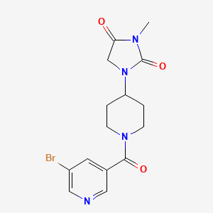 B2912305 1-(1-(5-Bromonicotinoyl)piperidin-4-yl)-3-methylimidazolidine-2,4-dione CAS No. 2175979-44-7