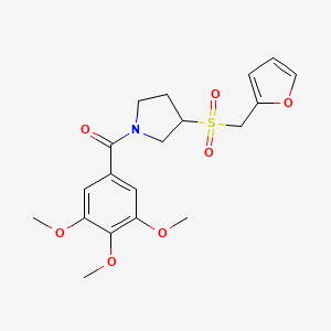 molecular formula C19H23NO7S B2914263 3-[(furan-2-yl)methanesulfonyl]-1-(3,4,5-trimethoxybenzoyl)pyrrolidine CAS No. 1788845-86-2