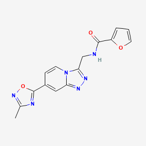 molecular formula C15H12N6O3 B2915009 N-{[7-(3-Methyl-1,2,4-oxadiazol-5-YL)-[1,2,4]triazolo[4,3-A]pyridin-3-YL]methyl}furan-2-carboxamide CAS No. 1775519-15-7
