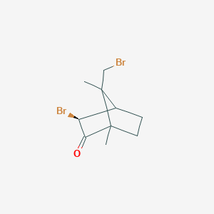 molecular formula C10H14Br2O B2916440 (3S)-3-bromo-7-(bromomethyl)-1,7-dimethylbicyclo[2.2.1]heptan-2-one CAS No. 60045-89-8