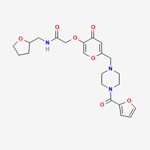2-((6-((4-(furan-2-carbonyl)piperazin-1-yl)methyl)-4-oxo-4H-pyran-3-yl)oxy)-N-((tetrahydrofuran-2-yl)methyl)acetamide