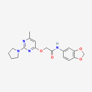 B2917632 N-(1,3-benzodioxol-5-yl)-2-{[6-methyl-2-(pyrrolidin-1-yl)pyrimidin-4-yl]oxy}acetamide CAS No. 1030097-27-8