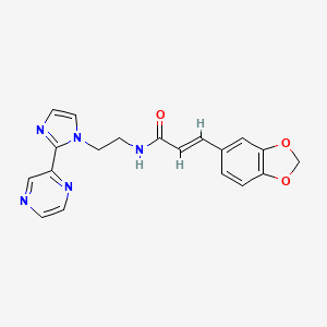 molecular formula C19H17N5O3 B2917693 (E)-3-(benzo[d][1,3]dioxol-5-yl)-N-(2-(2-(pyrazin-2-yl)-1H-imidazol-1-yl)ethyl)acrylamide CAS No. 2035018-20-1