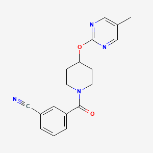 molecular formula C18H18N4O2 B2918524 3-[4-(5-Methylpyrimidin-2-yl)oxypiperidine-1-carbonyl]benzonitrile CAS No. 2379977-19-0
