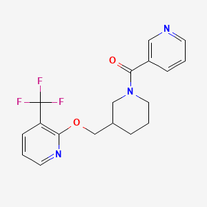 B2919843 Pyridin-3-yl-[3-[[3-(trifluoromethyl)pyridin-2-yl]oxymethyl]piperidin-1-yl]methanone CAS No. 2379976-00-6