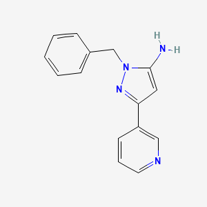 molecular formula C15H14N4 B2919948 2-Benzyl-5-pyridin-3-ylpyrazol-3-amine CAS No. 93734-29-3