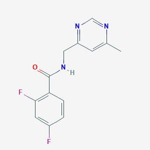 molecular formula C13H11F2N3O B2921997 2,4-difluoro-N-[(6-methylpyrimidin-4-yl)methyl]benzamide CAS No. 2195951-66-5