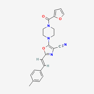 (E)-5-(4-(furan-2-carbonyl)piperazin-1-yl)-2-(4-methylstyryl)oxazole-4-carbonitrile