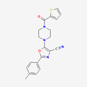 molecular formula C20H18N4O2S B2922972 2-(4-Methylphenyl)-5-[4-(thiophen-2-ylcarbonyl)piperazin-1-yl]-1,3-oxazole-4-carbonitrile CAS No. 946308-15-2
