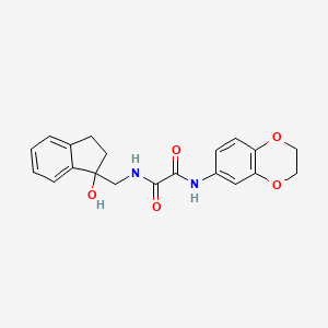 molecular formula C20H20N2O5 B2923257 N'-(2,3-dihydro-1,4-benzodioxin-6-yl)-N-[(1-hydroxy-2,3-dihydro-1H-inden-1-yl)methyl]ethanediamide CAS No. 1351620-94-4