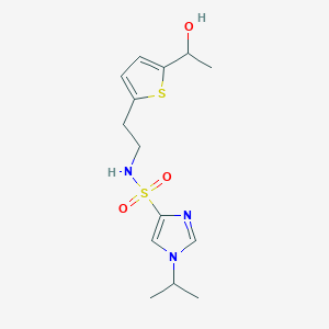 molecular formula C14H21N3O3S2 B2923563 N-(2-(5-(1-hydroxyethyl)thiophen-2-yl)ethyl)-1-isopropyl-1H-imidazole-4-sulfonamide CAS No. 2034256-56-7