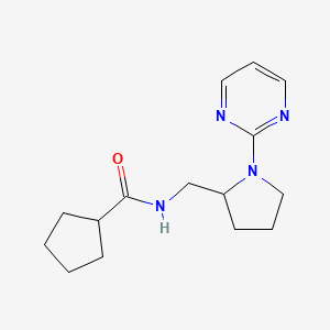 molecular formula C15H22N4O B2924570 N-{[1-(pyrimidin-2-yl)pyrrolidin-2-yl]methyl}cyclopentanecarboxamide CAS No. 2097933-54-3
