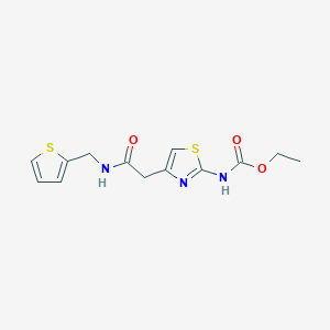 molecular formula C13H15N3O3S2 B2925945 Ethyl (4-(2-oxo-2-((thiophen-2-ylmethyl)amino)ethyl)thiazol-2-yl)carbamate CAS No. 946284-72-6